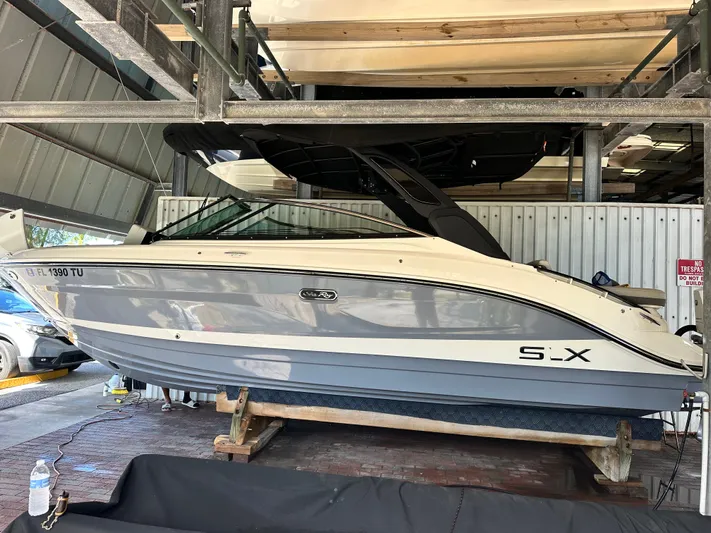  Yacht Photos Pics 2024 Sea Ray 260 SLX OB boat in a boatyard.