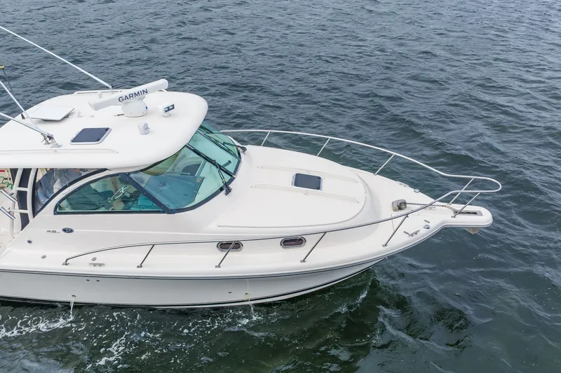  Yacht Photos Pics 2012 Pursuit OS 345 Offshore boat on the water.