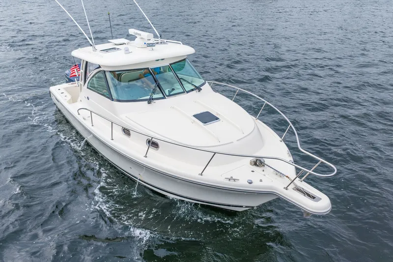  Yacht Photos Pics 2012 Pursuit OS 345 Offshore boat on the water.