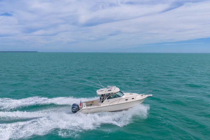  Yacht Photos Pics 2012 Pursuit OS 345 Offshore cruising on open sea.