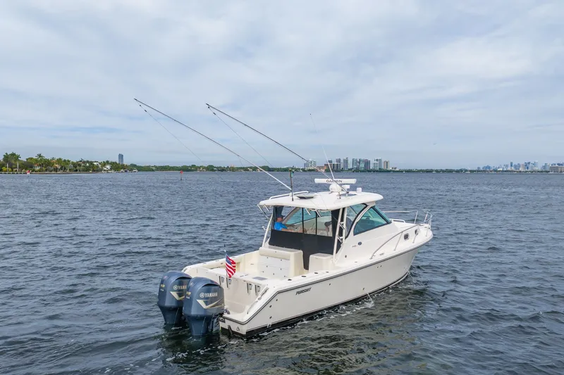  Yacht Photos Pics 2012 Pursuit OS 345 Offshore boat on open water.