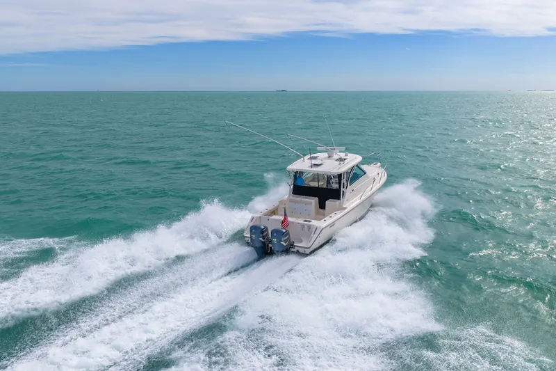  Yacht Photos Pics 2012 Pursuit OS 345 Offshore cruising on open sea.