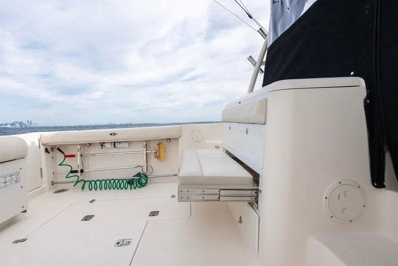  Yacht Photos Pics 2012 Pursuit OS 345 Offshore with spacious deck and seating area.