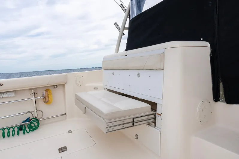  Yacht Photos Pics 2012 Pursuit OS 345 Offshore with fold-out seat.