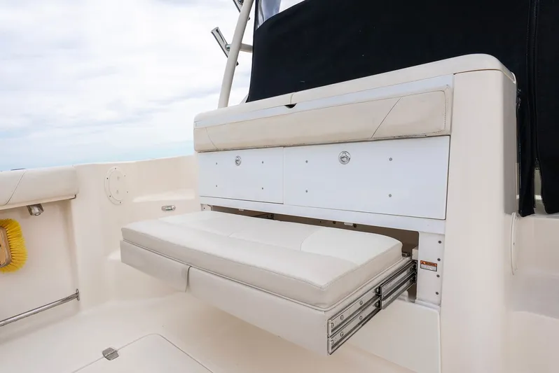  Yacht Photos Pics Pursuit OS 345 Offshore 2012, foldable seat in boat.