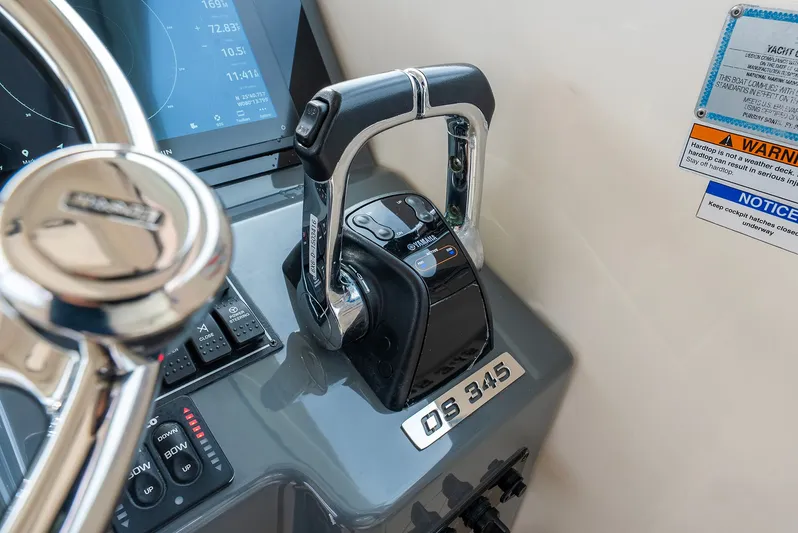  Yacht Photos Pics Control console of 2012 Pursuit OS 345 Offshore with controls.