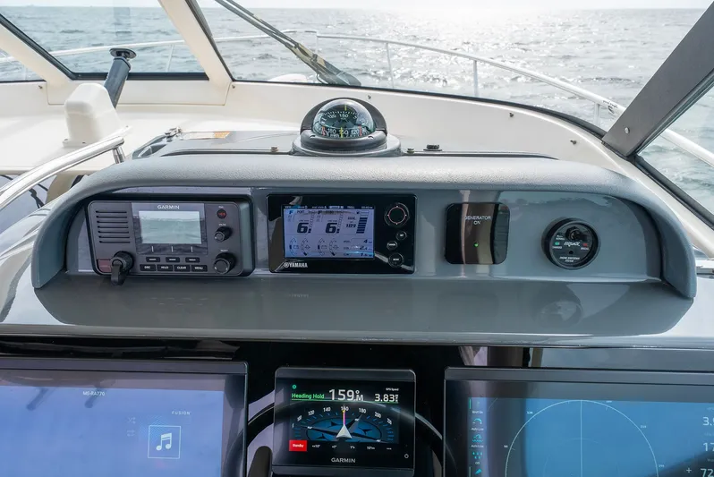  Yacht Photos Pics Dashboard of 2012 Pursuit OS 345 Offshore with navigation systems.