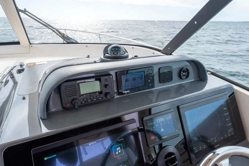  Yacht Photos Pics Dashboard of 2012 Pursuit OS 345 Offshore on the sea.