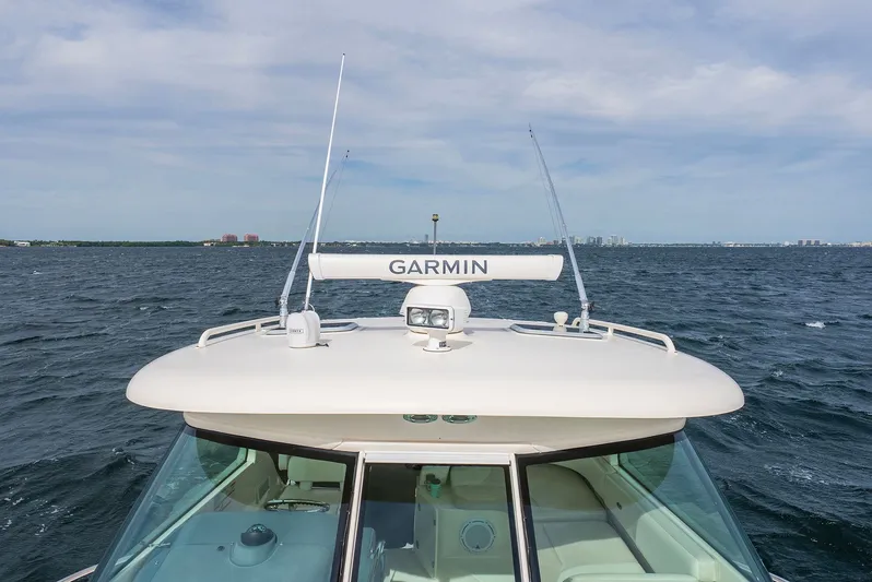  Yacht Photos Pics 2012 Pursuit OS 345 Offshore with Garmin equipment on open sea.