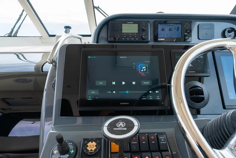  Yacht Photos Pics 2012 Pursuit OS 345 Offshore helm with Garmin display.