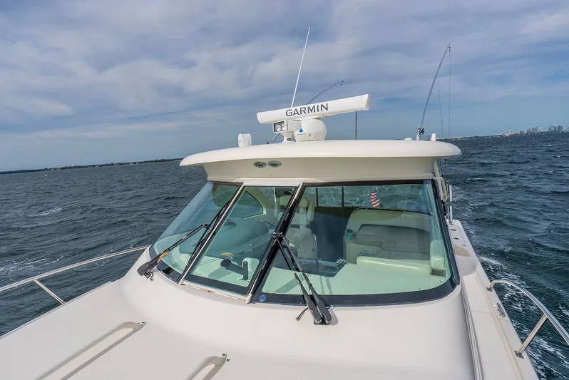  Yacht Photos Pics 2012 Pursuit OS 345 Offshore on open sea with Garmin equipment.