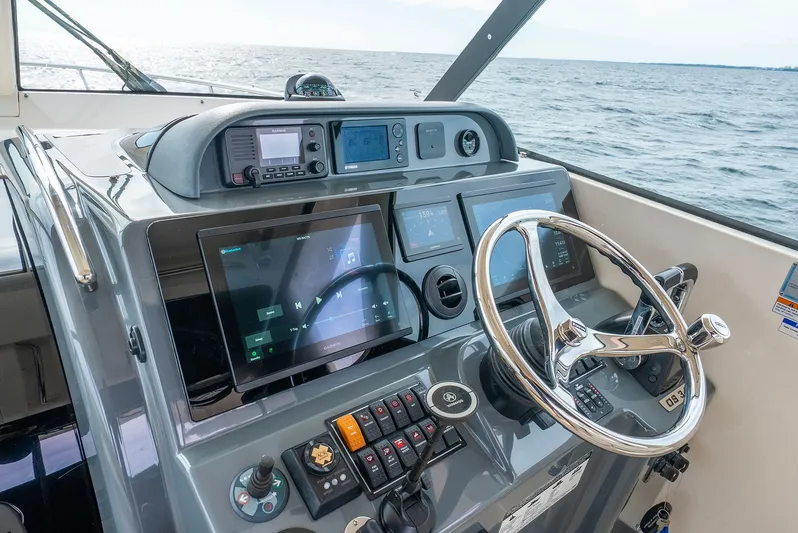  Yacht Photos Pics 2012 Pursuit OS 345 Offshore helm with ocean view.