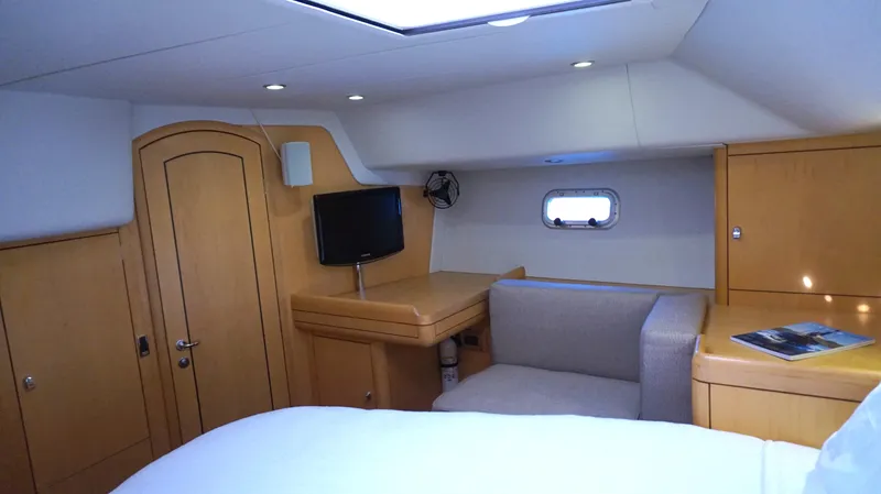 Dolce Vita Yacht Photos Pics Luxurious interior of 2008 Oyster 46 yacht with cozy seating and modern amenities.