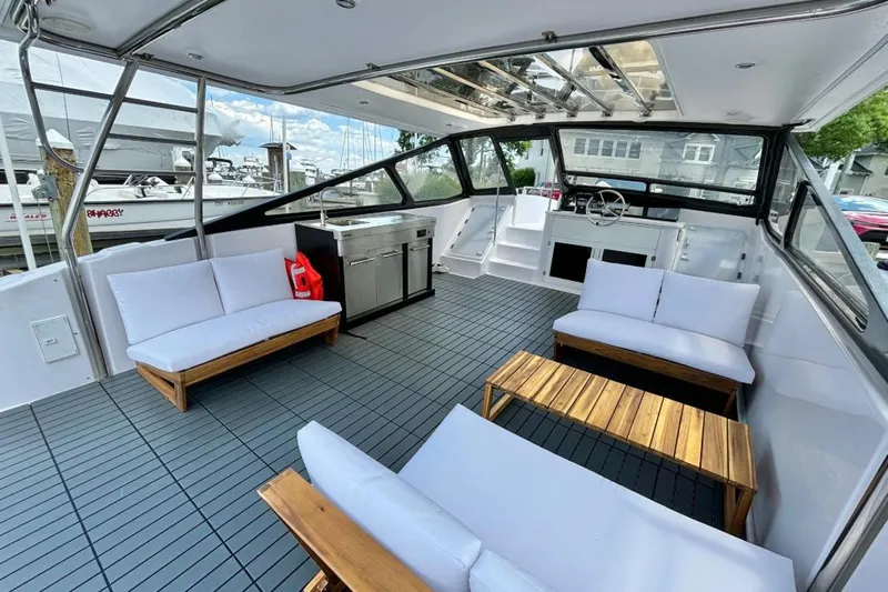 Dealer Demo Yacht Photos Pics Spacious interior of 2019 Gemini Freestyle 399 Power boat with modern seating and helm.