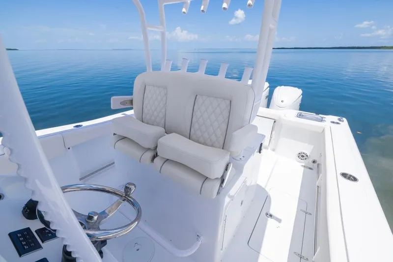  Yacht Photos Pics 2026 Sea Hunt Gamefish 30 boat with forward seating, steering wheel, and ocean view.
