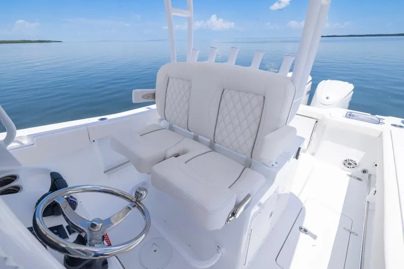  Yacht Photos Pics 2026 Sea Hunt Gamefish 30 Forward Seating with luxurious white interior and steering wheel.