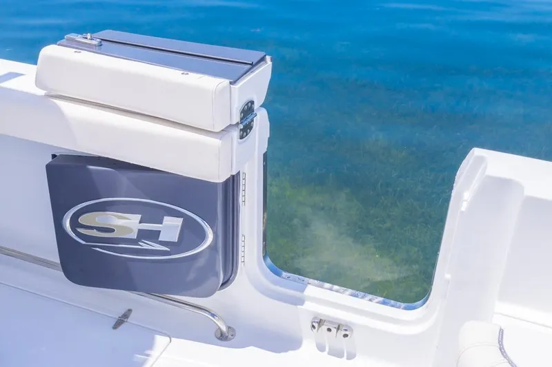  Yacht Photos Pics 2026 Sea Hunt Gamefish 30 boat with forward seating, featuring sleek design and clear blue water.