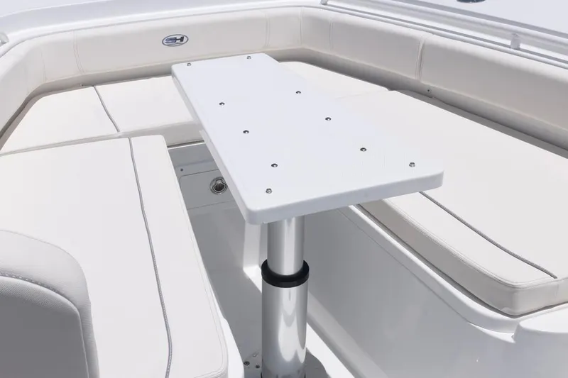  Yacht Photos Pics 2026 Sea Hunt Gamefish 30 Forward Seating with white cushioned seating and table.