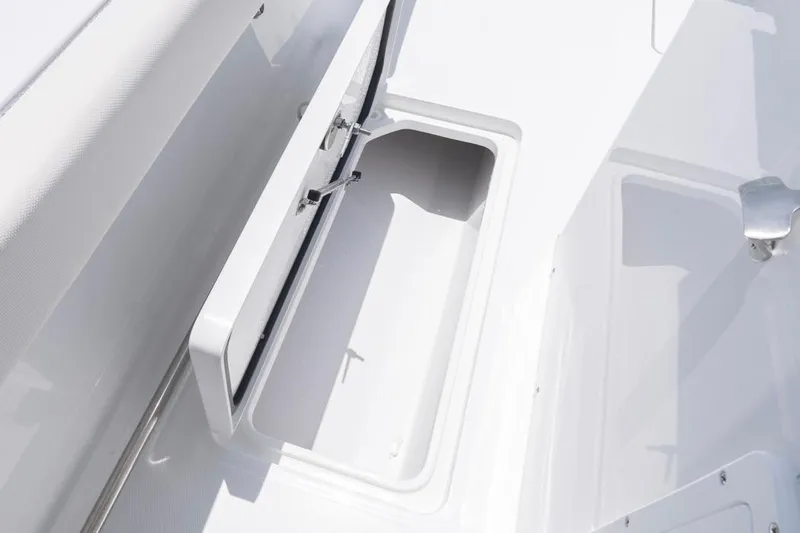  Yacht Photos Pics 2026 Sea Hunt Gamefish 30 Forward Seating storage compartment, open and empty.