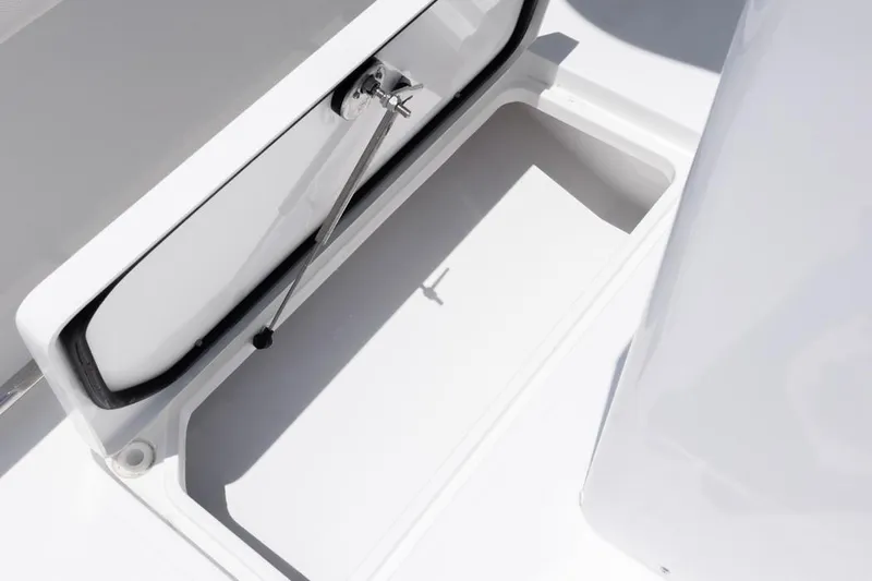  Yacht Photos Pics Open storage compartment on 2026 Sea Hunt Gamefish 30 Forward Seating boat.