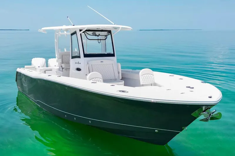  Yacht Photos Pics 2026 Sea Hunt Gamefish 30 Forward Seating boat on clear turquoise water.