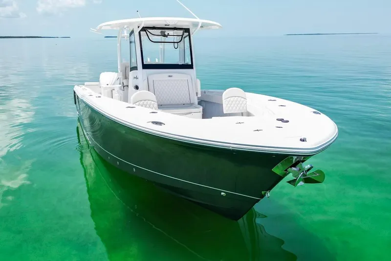  Yacht Photos Pics 2026 Sea Hunt Gamefish 30 Forward Seating boat on clear turquoise water.