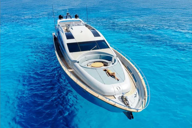 Deea II Yacht Photos Pics Luxurious 2009 Cerri Cantieri Navali 102 yacht on clear blue ocean waters.