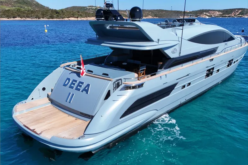 Deea II Yacht Photos Pics Luxurious 2009 Cerri Cantieri Navali 102 yacht on clear blue water.
