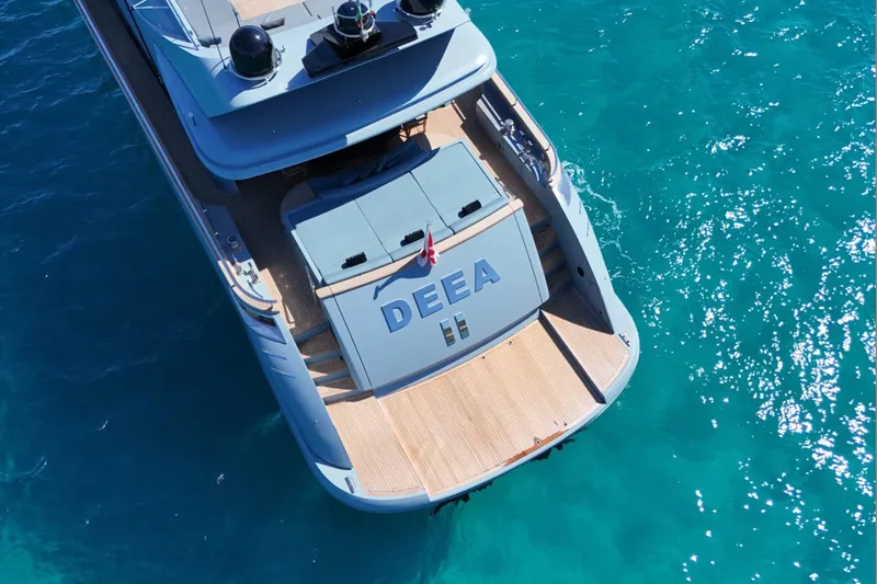 Deea II Yacht Photos Pics Aerial view of 2009 Cerri Cantieri Navali 102 yacht on turquoise water.