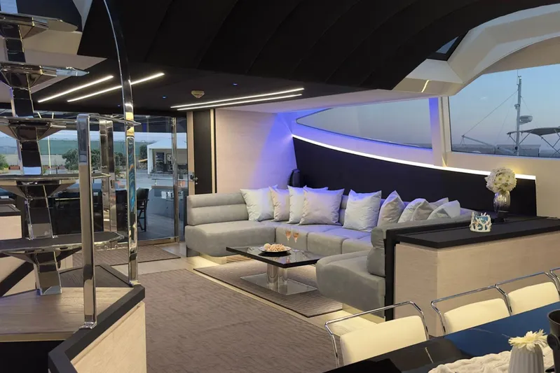 Deea II Yacht Photos Pics Luxurious interior of 2009 Cerri Cantieri Navali 102 yacht with modern design and elegant furnishings.