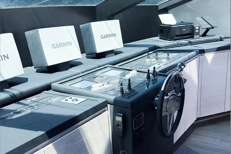 Deea II Yacht Photos Pics Control panel of 2009 Cerri Cantieri Navali 102 yacht with Garmin navigation displays.