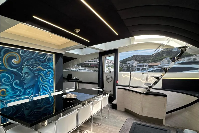 Deea II Yacht Photos Pics Luxurious interior of 2009 Cerri Cantieri Navali 102 yacht with modern art and sleek design.