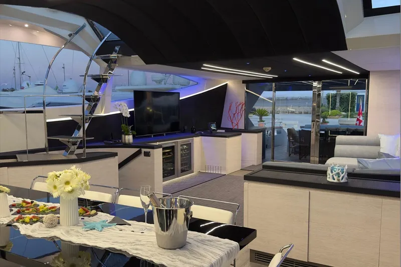 Deea II Yacht Photos Pics Luxurious interior of 2009 Cerri Cantieri Navali 102 yacht with modern decor and elegant furnishings.