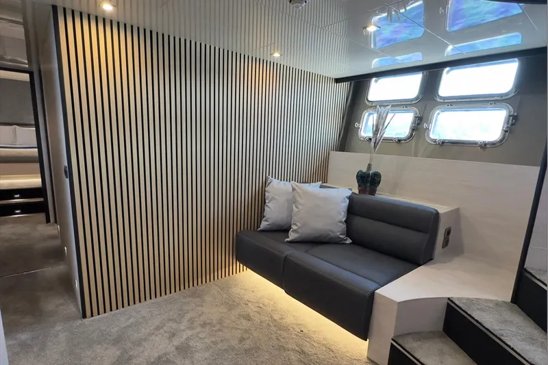 Deea II Yacht Photos Pics Luxurious interior of 2009 Cerri Cantieri Navali 102 yacht with modern seating and elegant design.