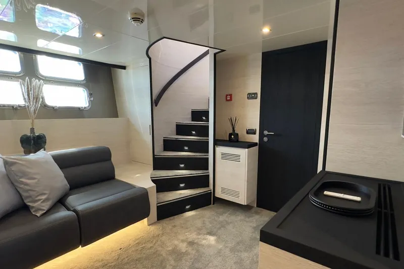 Deea II Yacht Photos Pics Luxurious interior of 2009 Cerri Cantieri Navali 102 yacht with modern design and elegant furnishings.