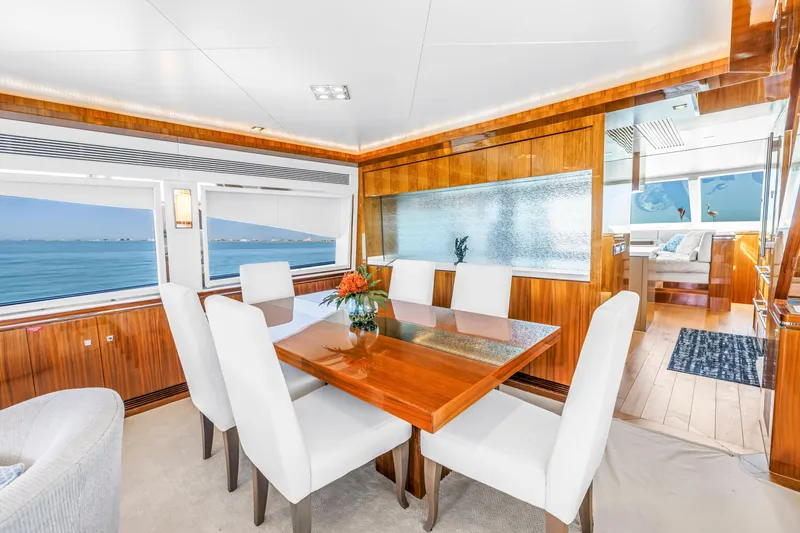 Encore Yacht Photos Pics Luxurious dining area on 2015 Horizon E88 yacht with ocean view and elegant decor.