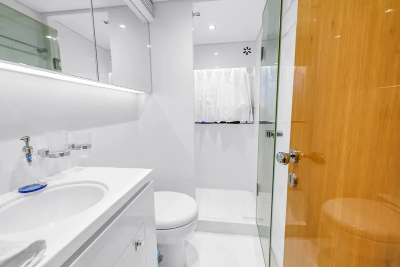 Encore Yacht Photos Pics Luxurious bathroom interior on 2015 Horizon E88 yacht, featuring modern fixtures and glass shower.
