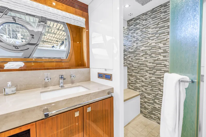 Encore Yacht Photos Pics Luxurious bathroom interior of 2015 Horizon E88 yacht with modern fixtures and elegant design.