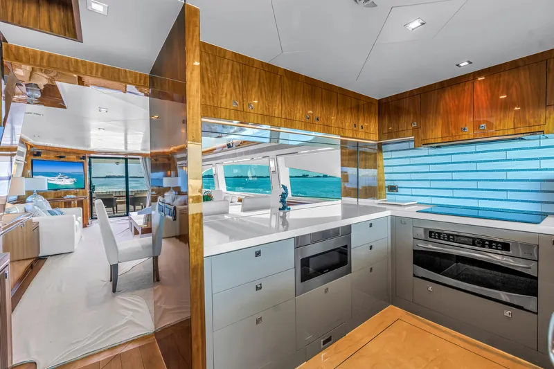 Encore Yacht Photos Pics Luxurious kitchen interior on 2015 Horizon E88 yacht with ocean view.