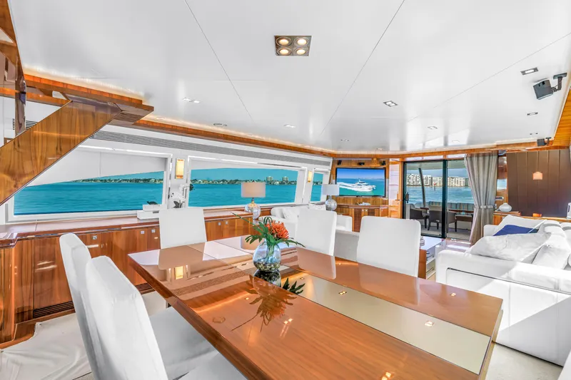 Encore Yacht Photos Pics Luxurious interior of 2015 Horizon E88 yacht with elegant dining area and ocean views.