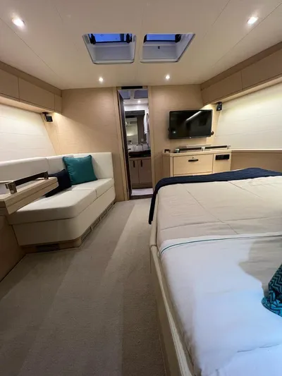  Yacht Photos Pics Luxurious interior of a 2021 Jeanneau 64 yacht, featuring a spacious cabin and modern amenities.