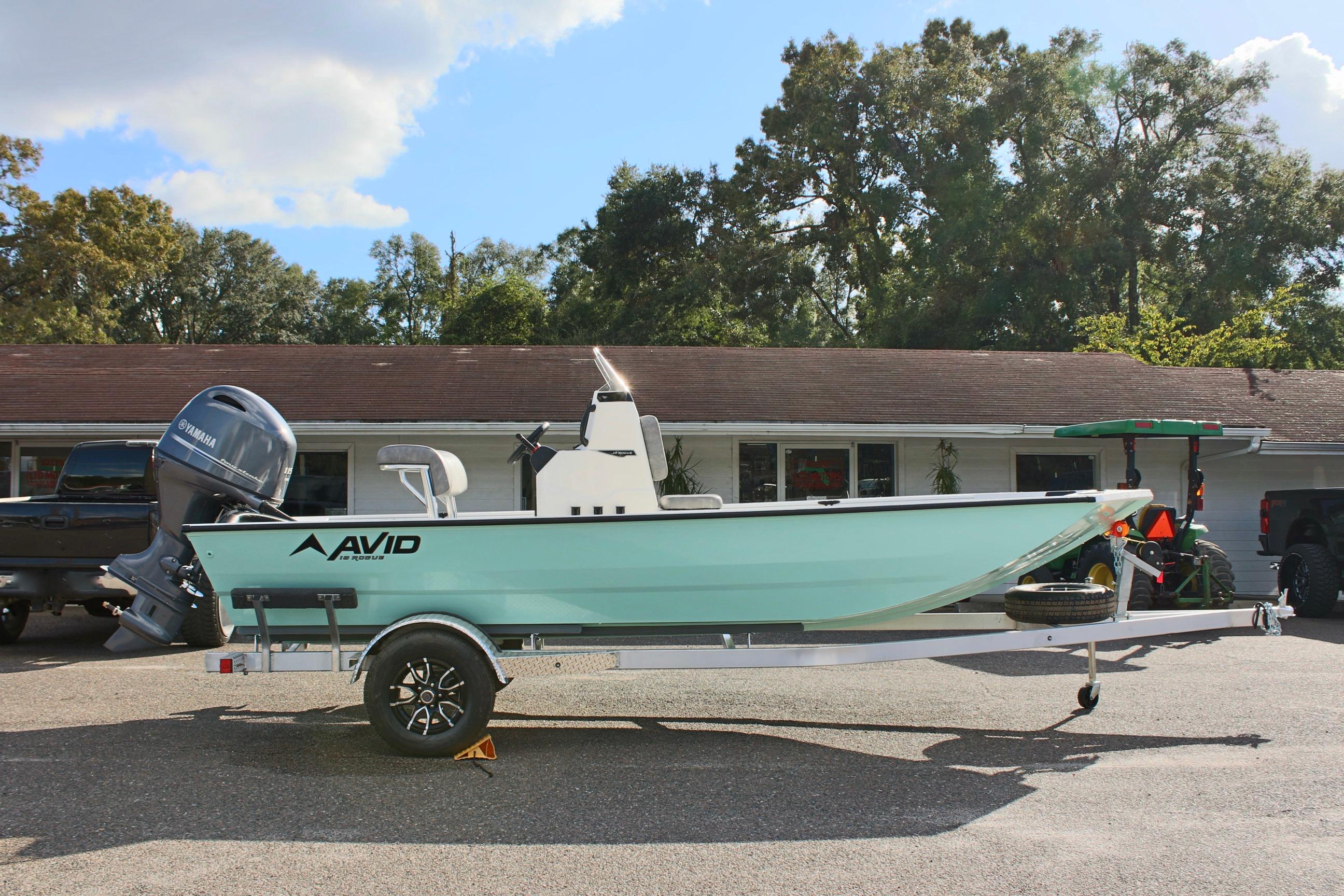 2025 Avid 18 Rogue CC boat on trailer, parked outdoors.