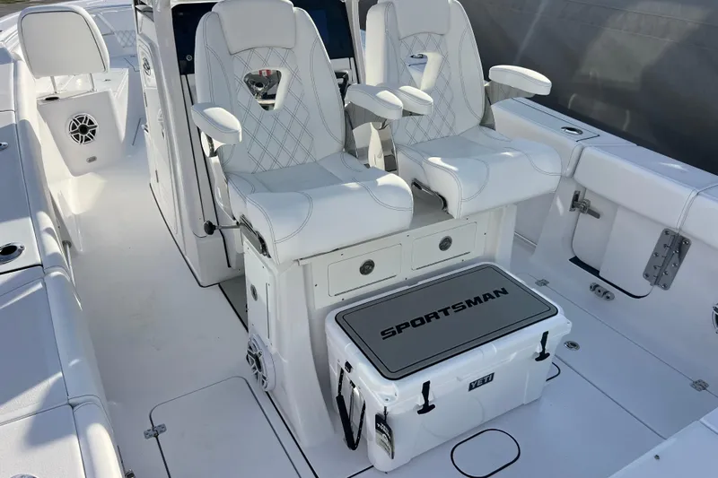  Yacht Photos Pics 2026 Sportsman Heritage 261 Center Console with white seating and storage.