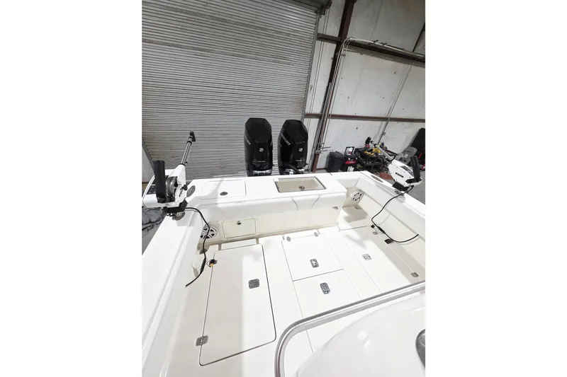  Yacht Photos Pics 2019 SeaVee 320B boat interior with storage compartments and fishing equipment.