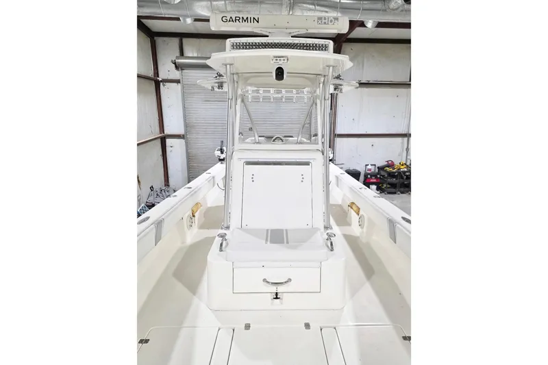  Yacht Photos Pics 2019 SeaVee 320B boat interior with Garmin equipment in a storage facility.