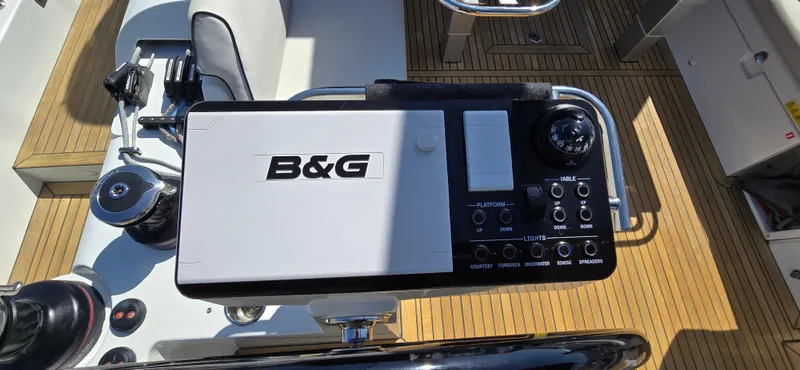 Wildflower Yacht Photos Pics B&G navigation system on 2021 Beneteau Oceanis Yacht 54, featuring teak deck.
