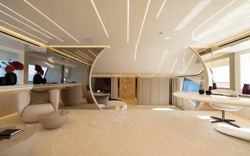  Yacht Photos Pics Luxurious interior of 2022 Mangusta 165 REV yacht with modern design and elegant furnishings.