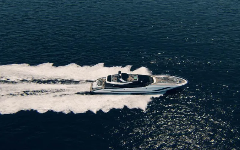  Yacht Photos Pics Aerial view of 2022 Mangusta 165 REV yacht cruising on open sea.