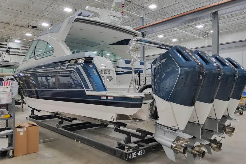 Yacht Photos Pics 2026 Formula 400 Super Sport Crossover boat with Mercury engines in a showroom.