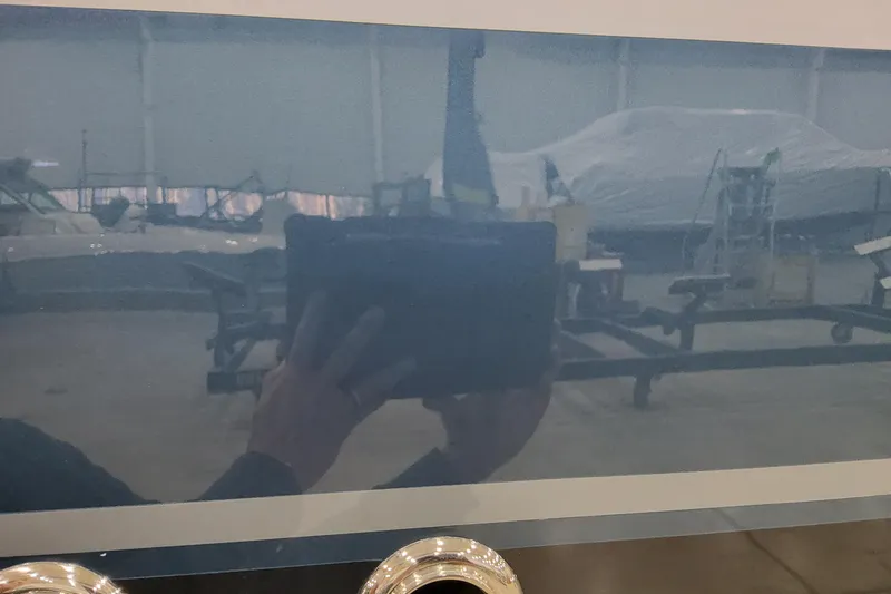  Yacht Photos Pics Reflection on 2026 Formula 400 Super Sport Crossover in a showroom setting.